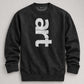 A dark gray crewneck sweatshirt with a large, vertically oriented white distressed graphic spelling 'art' on the front, displayed flat against a neutral gray background.